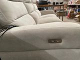 a recliner that is sitting in the middle of a room