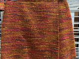 a colorful skirt hanging on a rack in a store