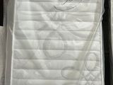 many mattresses stacked on top of each other on the floor
