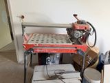 a small table with a machine on it in a room