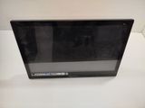 a black laptop computer sitting on a white table