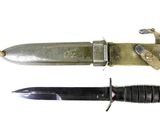 two different types of knives on a white background