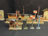 a lot of toy buildings that are sitting on a table