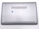 a laptop that is sitting on a white surface