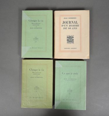 three books sitting on top of each other on top of a table