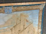a picture of a painting of a ship on the ground