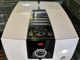 a coffee machine sitting on a counter in a kitchen