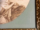 a picture of a picture of a woman reading a book