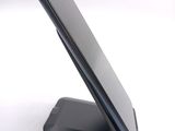 a close up of a cell phone on a stand