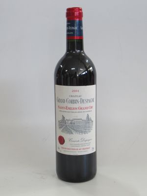 a bottle of wine that is sitting on a table