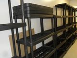a room with a bunch of shelvings in it