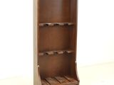 an image of a wooden wine rack in a white room