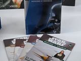 a lot of star wars books on the table