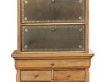 a tall wooden dresser with a glass door on top