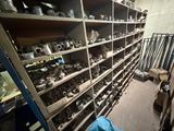 a room with shelves full of different types of tools