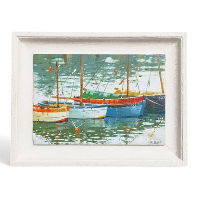 three boats that are sitting in the water