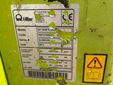 a close up of a yellow box with a sticker on it