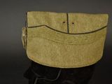 an image of a military hat with a tassel on it