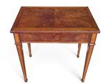 a small wooden table with a drawer on top of it