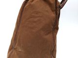 brown waxed canvas bag with brown leather handles