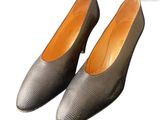 pair of women ' s black shoes on a white background