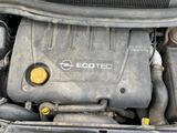 a picture of a car engine with its hood open