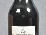 a bottle of wine that is sitting on a table