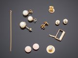 a collection of gold and pearl earrings and a chain