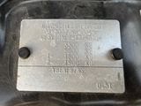 a close up of a metal plate with numbers on it