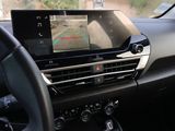 the interior of a car with a dash camera and a dash board