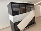 a refrigerator that has been wrapped up in a room