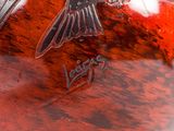 an image of a vase with a bird on it