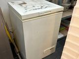 an image of a dirty refrigerator in a kitchen