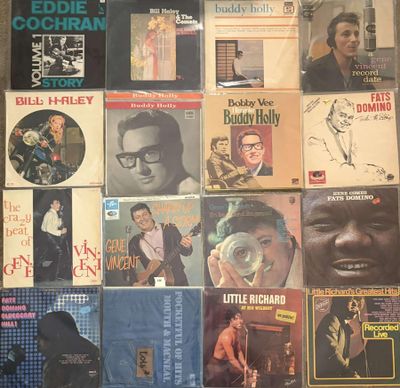 a lot of records on the floor of a room