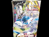 a bag of pokemon trading cards on a black background