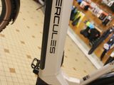 a white electric bike parked in a store