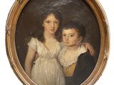 portrait of a young boy and a young girl in a gold frame