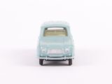 a small toy car that is sitting on a white surface