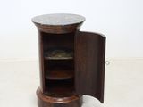an image of a small wooden cabinet with a marble top