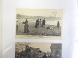 an old black and white photo of a group of people in a field