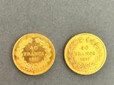 two gold coins, one of which is a sovereign and the other of which is a sovereign