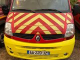 a yellow and red van parked next to a red and yellow truck