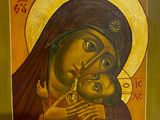 a painting of a woman holding a child in her arms