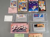 il y a plein de jeux Nintendo sur la table