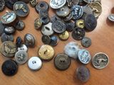 a lot of buttons that are on a table