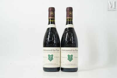 two bottles of wine sitting next to each other on a table