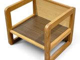 a wooden chair with a brown seat on a white background