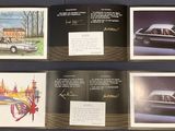 several autographs of cars are lined up on a table
