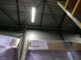 two boxes that are sitting on a pallet in a warehouse