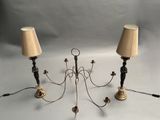 two lamps that are on a table with a white background